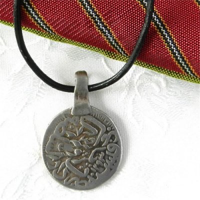 antique_afghan_coin_one_hundred_thirty_eight_years_old_on_leather_cord_691250ae.jpg