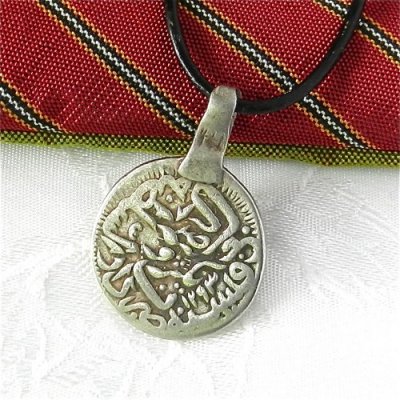 antique_afghan_coin_one_hundred_thirty_eight_years_old_on_leather_cord_e527ed8d.jpg