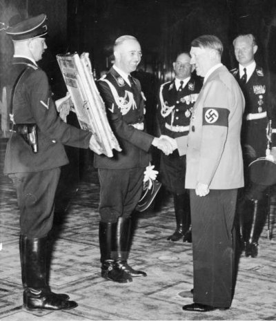 reichsfc3bchrer-ss-heinrich-himmler-presents-hitler-with-a-gift.jpg