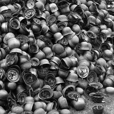 Capture pile of German combat helmets-May 1945_2.1.JPG