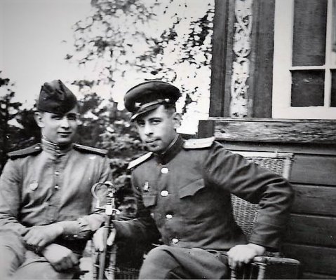Russian soldiers with  captured daggers.JPG