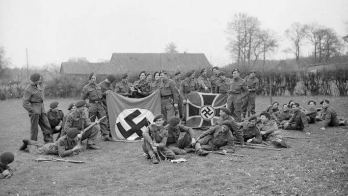 Troop of the 45th Royal Marine Commandos with captured German trophies..JPG